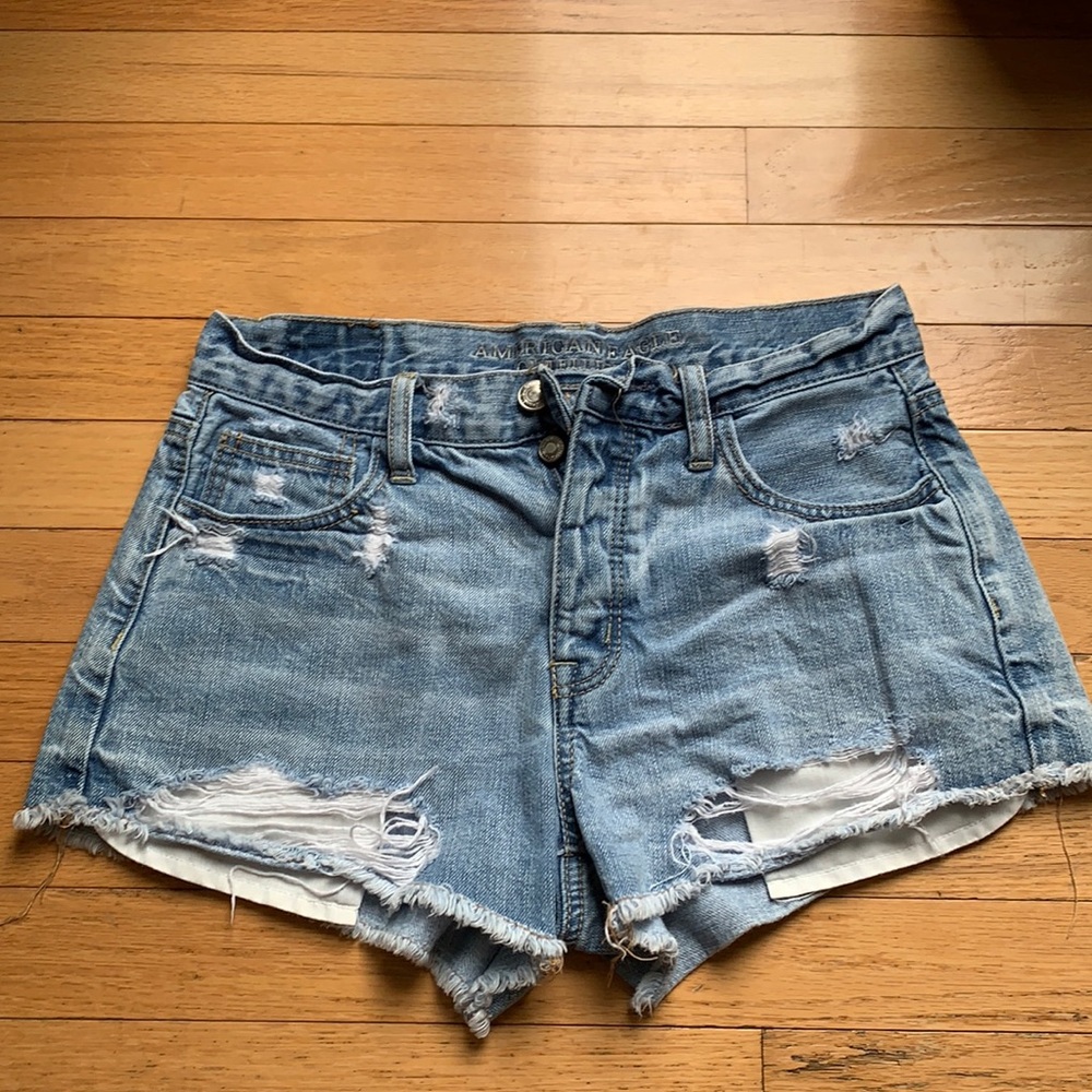Women’s light wash denim shorts.